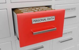 Steel cabinet with red drawer with words personal data. Representing POPIA in marketing